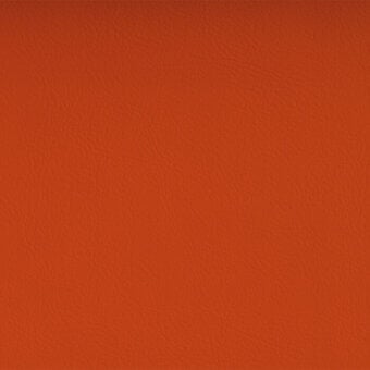 Valencia Orange 6019 fabric by Spradling, featuring a matte, leather-like texture with a consistent color and subtle, irregular grain pattern.